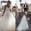 Arabe Nouvelles Robes De Mariée Sexy Une Ligne Bohème Chérie Dentelle Appliques Perles Balayage Train D'été Plage Boho Plus La Taille Formelle Robes De Mariée