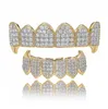 Nuevo Repleto de circonio dientes Grillz parte superior inferior 18K Color oro parrillas boca Dental vampiro Hip Hop joyería de moda joyería de rapero