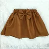 INS Baby girls Bow Faldas plisadas Color sólido Patrón de onda infantil Falda recién nacida 2019 Moda de verano Boutique niños Ropa C5990