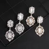 Personlig modehollowedout full av diamantörhängen europeiska och amerikanska enkla populära lady pendellörhängen JCC1039252771