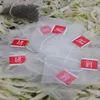 Sachets filtres à thé 500pcs / lot en nylon avec étiquette Vider les sachets à thé jetables Sac à tamis à thé Sac de rangement clair sac de rangement 5.8 * 7CM FFA1445