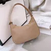 Novo designer de moda bolsa feminina bolsa de ombro mini alça crossbody bolsas de alta qualidade encerado de náilon importado bolsa multicolorida 21 cm