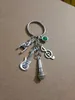 Whole Vintage Silver Green star stone Music symbolmicrophoneguitarrock gesture Charm Keychain Fit Key Chains Accessories Je2532752