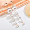 Imitation pearl earrings, female banquet dress, fashion matching, elegant atmosphere