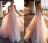 Blush Pink A Line Wedding Dresses 2020 Cap Short Sleeves Sheer Neck Illusion Button Back Lace Appliques Bridal Gowns Beach Wedding Dresses