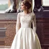 2020 Ny elegant fantastisk elfenben satin bröllopsklänningar lyxiga spetsapplikrade Bateau långa ärmar plus storlek Bridal Gown Vestios de Novia