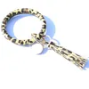 Frauen-Quasten-Armband PU-Leder-Verpackungs-Schlüsselring-Partei-Leoparden-Lilien-Druck-Schlüsselanhänger-Schlüsselring-Kreis-Armband-Ketten-Mode-Sonnenblumen-Flaggen-Muster-Kette runder Wristlet