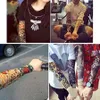Tryck elastisk andningsbar sport förlängda skinn falska tatuering arm varmare skydd ärmar män pojke sömlösa nylon tatuering ärmar dh0705