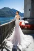 Neue rückenfreie Brautkleider mit langen Ärmeln, Meerjungfrau, transparenter, tiefer Ausschnitt, Trompeten-Brautkleid, Sweep-Zug, Tüll-Spitze-Brautkleid