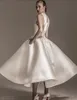 Vintage fotledslängd bröllopsklänningar med stor båge 2019 Hög halsmatta fläckar puffy kjol prinsessan trädgård kyrka kort bröllop klänning269z