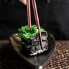 Piatti da sushi giapponesi a forma di foglia lunga fatti a mano Piatto da portata in ceramica Vassoio da portata per Sashimi Snack Dessert Nero metallizzato