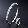 シンプルなファッションの高級ジュエリー925スターリングシルバープリンセスカットインズトップ販売ジュエリーセットホワイトトパーズ結婚指輪バングル女性ギフト