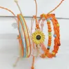 Europa y los Estados Unidos línea de cera cuerda de mano pequeña fresca tejida a mano impermeable 4 piezas mujer boho viento pulsera regalo