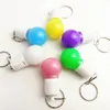 Clés Flash LED de vente chaude du fabricant, pendentif ampoule LED, cadeau d'activité créatif et pratique