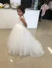 2020 Cheap White Ivory Flower Girl Dresses For Weddings Lace Appliques Sleeveless Sweep Train Girls Pageant Dress Prom Kids Communion Gowns