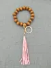 Cross-border hand-beaded wooden bead elastic rope bracelet keychain accessories tassel pendant