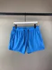 Mode-m517 män shorts twill tryckt fritidssport män i hög kvalitet strandbyxor badkläder Bermuda manlig bokstav surf liv män simma305l