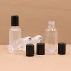 Botellas de cristal esmerilado perfume del aceite esencial Roll en botella de acero inoxidable de bola de rodillo Negro Caps 5 ml a 100 ml