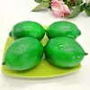 100pcs Frutas Artificial Simulação verde / amarelo limão Modelo Toy Ordinária Tamanho do casamento Detalhes no Atire Props Decoração