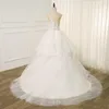 Vackra land bröllopsklänningar tillbaka spets prinsessa boll klänning anpassad tulle kjol ruffles brudklänning sweep tåg applikationer bröllopsklänningar