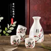 Japanese Sake Set Ceramic Drinkware with 1 Decanter 4 Cups Black Chinese Calligraphy and Red Plum Blossom Pattern Asian Wine Gifts