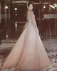 Eleganckie luksusowe suknie wieczorowe z koralikami linia z rękawami peleryny pasy długi różowy tiul bal suknie wieczorowe na przyjęcie zroszony Vestidos Festa