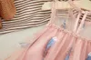 Mit Federn bestickte ärmellose Röcke für Babys in Weiß und Rosa, Mädchen-Kleid, Kinder-Sommer-Boutiquen, Kleidung, Mädchen-Designer-Kleid