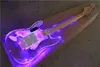 La chitarra elettrica personalizzata con corpo in acrilico leggero a LED con ponte Floyd Rose, pickup HSH, può essere personalizzata