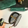 Novos óculos de sol designers de moda 0307 Piloto dobrável com cristal Diamond Frame Summer Avant-Garde Style UV 400 Lens2047
