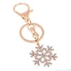 Boże Narodzenie Snowflake Brelok Kwiat śniegu Kryształ Rhinestone Brelok Torebka Wiszące Decor Key Chains Pierścionki Biżuteria Akcesoria Prezent