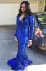 Bling Royal Blue Mermaid Prom Kleider Neue sexy sexy sexuelle Pailletten-Langarm-Sweeves Sweep-Zug maßgeschneiderte Partykleider Abendkleid Kleid Kleidung