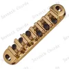 A Set of Gold Roller Saddle Bridge and Tailpiece For Electric guitar accessories parts Musical instrument Small Stopbar studs