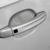Car Styling 4PCS Manija de la puerta del coche Scratch Protector Film Etiqueta protectora Vinilo de fibra de carbono para todos los autos para Cruze Opel Fort Mazda Peugeot