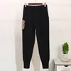 Femmes deux pièces pantalons nouvelle mode 2 pièces noir gris haut pantalon paillettes costume perles femmes combinaison tricot automne hiver casual en gros