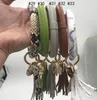 Bangle Keychain Armband PU Läder Key Ringhållare Personlig Tassel Wristlet Key Ringa Kvinnor Tjej Mode Smycken Leopard 200PCS DW4208