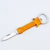Utomhus Mini Folding Kniv med flasköppnare 2 i 1 fickkniv Multifunktionella överlevnadsknivar Portable Saber Key Pendant Fruit Knife EDC