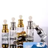 Rensa glas Essential Oil Perfume Flaskor Flytande Reagenspipettflaskor Ögondroppar Aromaterapi Pläterad Guld Silver Cap 20-30-50ml Grossist