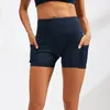 Running Shorts Hög midja Kvinnor med Pocket Seamless Hip-up Tight Elastic Sport Push Up Fitness Yoga Gym Kläder