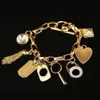 Nowe najwyższej jakości aluminiowe bransoletki na klucze z klejnotem w kształcie serca srebrne lub pozłacane wisiorki uroku bransoletki bransoletka biżuteria dla kobiet prezent