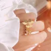 Tendencia de moda individual Estilo nórdico dama flor de la hierba de la suerte Accesorios de baile carga Anillo popular Celebridades regalo perfecto305r