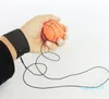 Wholethrowing Bouncy Rubber Balls Kids Funny Elastic Reaction Training Wrist Band Ball For Outdoor Games Toy Novelty 25xq UU7071879