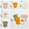 Sommar baby kläder brev spädbarn pojke t-shirt bomull nyfödd tjej romer kortärmad barn jumpsuit boutique baby kläder dw5572