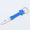 Outdoor Mini Folding Knife with Bottle Opener 2 in 1 Pocket Knife Multifunctional Survival Knives Portable Saber Key Pendant Fruit Knife EDC