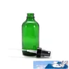 Gröna glasflaskflaskor med svart fin dimma spruta utformad för eteriska oljor Parfymer Rengöringsprodukter Aromaterapiflaskor