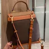 Kvinnors ryggsäck resa väska skolväska handväska handväska mode gammal blomma twist lås designer stor kapacitet äkta läder ryggsäck