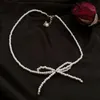 Fée Bowknot Petit Collier de Perles Clavicule Chaîne Femme Simple Tempérament Cou Rétro