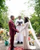 Pays Boho robes de mariée sirène col en V à manches longues en dentelle 2021 bohème hippie Robes de mariée balayage train Robes de mariée