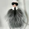 Luxury Fluffy Karl äkta Raccoon Fur Pompom Monster Bag Bugs Charm Keychain Plush Key Ring Leather Tassel Pompom7H7Uizazaz