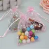 En gros 200 pcs/lot 7*9 cm papillon rose petites pochettes en Organza faveur sacs de mariage noël cordon Organza sacs-cadeaux