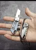 coltello da tasca piccolo s35vn pieghevole in titanio da campeggio esterno unico di alta qualità per il taglio giornaliero della sopravvivenza di salvataggio escursionistico EDC